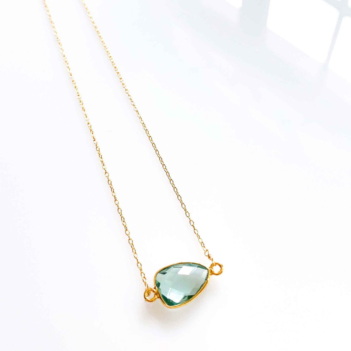 Green Amethyst Minimalist NecklaceSimple, gold necklace with beautiful green amethyst bezel set gemstones. Great for layering.- 16-18" long- Spring ring clasp- 14k gold plated fine Italian sterling sNecklacesPARKEN JEWELRYVettedArcGreen Amethyst Necklace