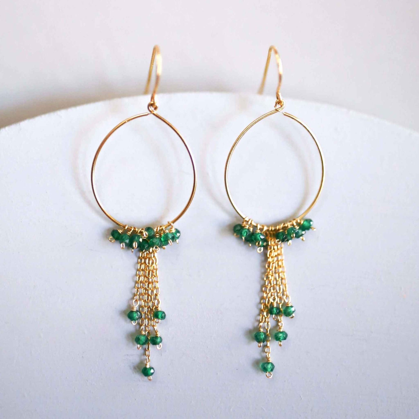 Green Apatite Mini Swing EarringsPerfection on a hoop. Delicate gemstone chains hang from super lightweight hoops.
- Green apatite stones- 3" long- French hooks
- 14k gold plated fine .925 Italian sEarringsPARKEN JEWELRYVettedArcGreen Apatite Mini Swing Earrings