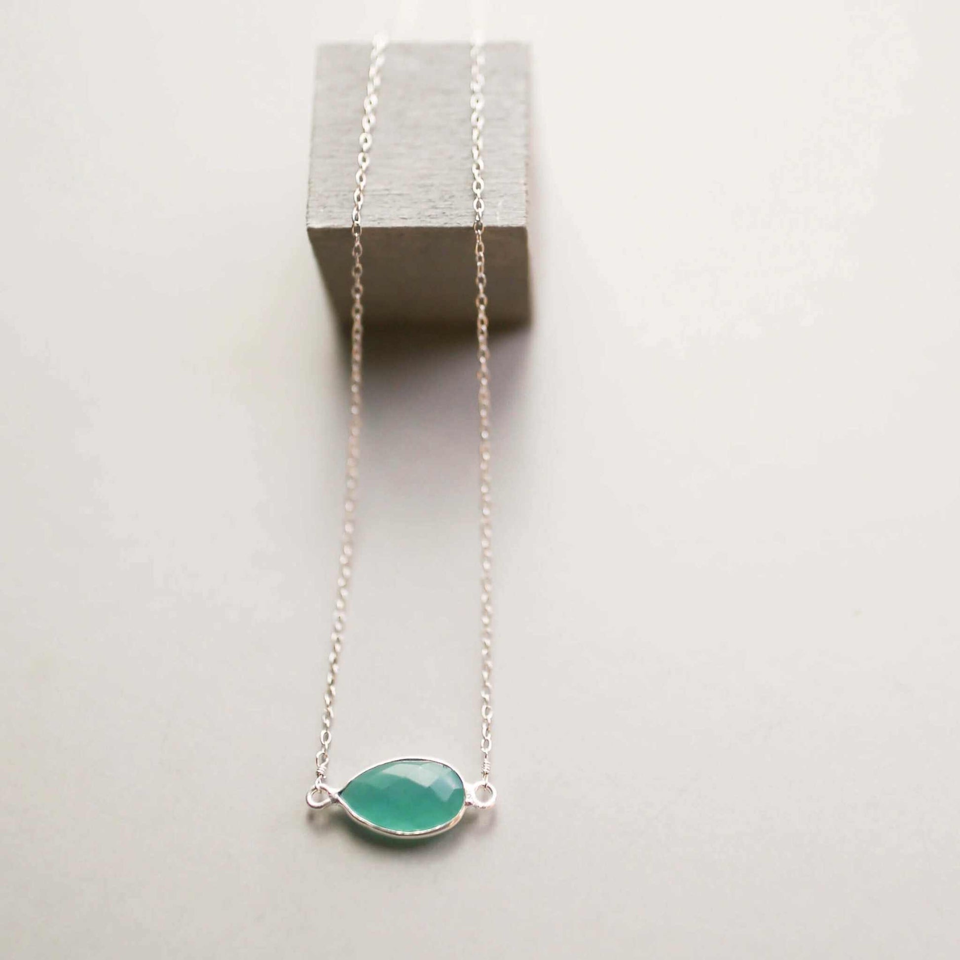 Green Apatite Silver Minimalist NecklaceSimple, silver minimalist necklace with a beautiful green apatite bezel set stone. Great for layering.- 16-18" long with 2" extender chain- Spring ring clasp- RhodiuNecklacesPARKEN JEWELRYVettedArcGreen Apatite Silver Necklace