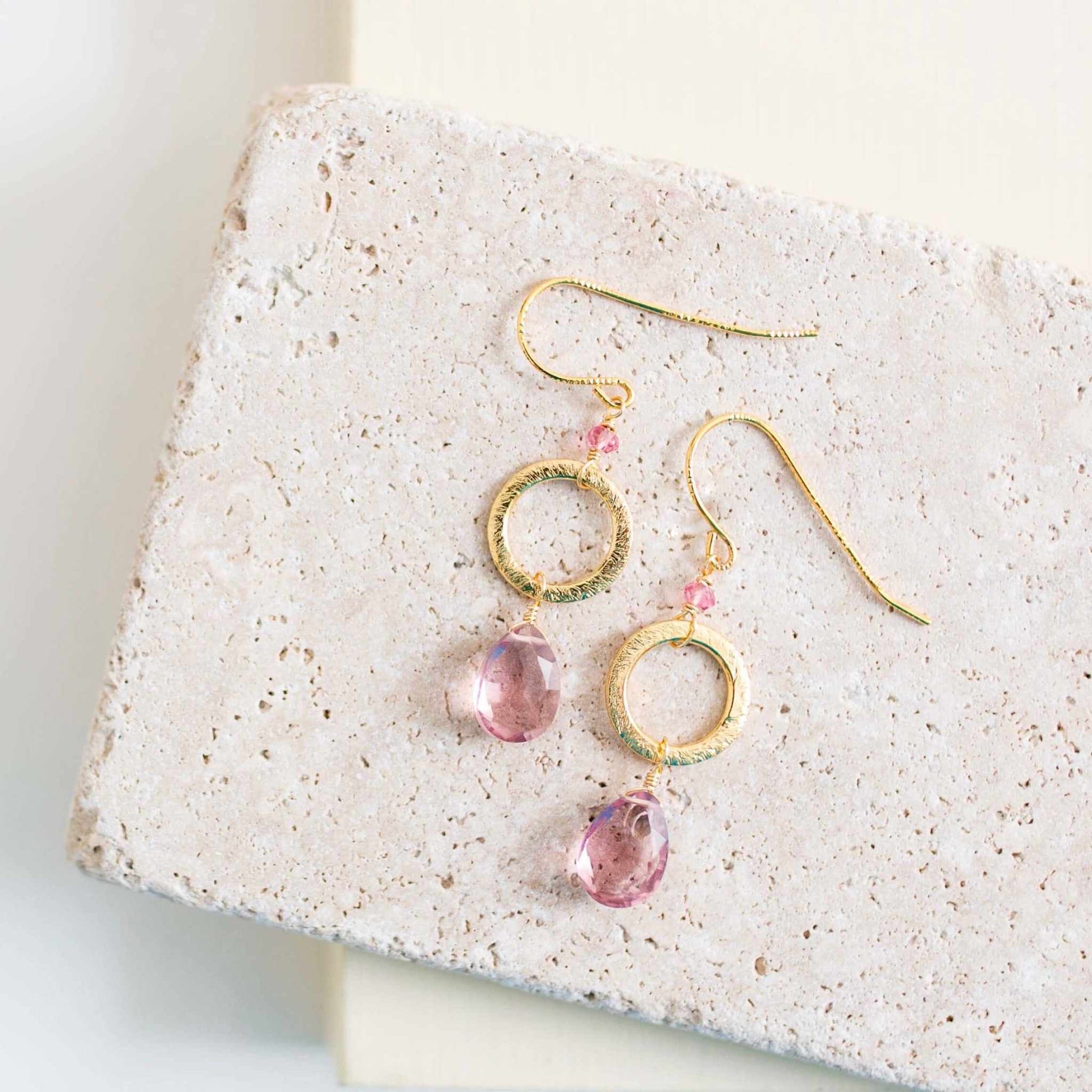 Pink Garnet Gold Drop EarringsPretty and simple, these pretty pink gems will be your go-to earrings.
- Pink garnet gemstones- 1.5" long- French hooks- 14k gold plated .925 fine Italian sterling sEarringsPARKEN JEWELRYVettedArcPink Garnet