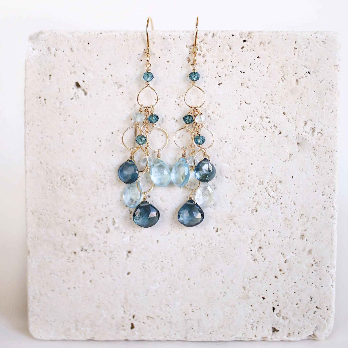 Iolite & Aquamarine Gold Waterfall EarringsElegant Iolite &amp; Aquamarine Gold Waterfall Earrings feature a unique tiered chandelier earring design, set in 14k gold plated over fine .925 Italian sterling silEarringsPARKEN JEWELRYVettedArcIolite & Aquamarine
