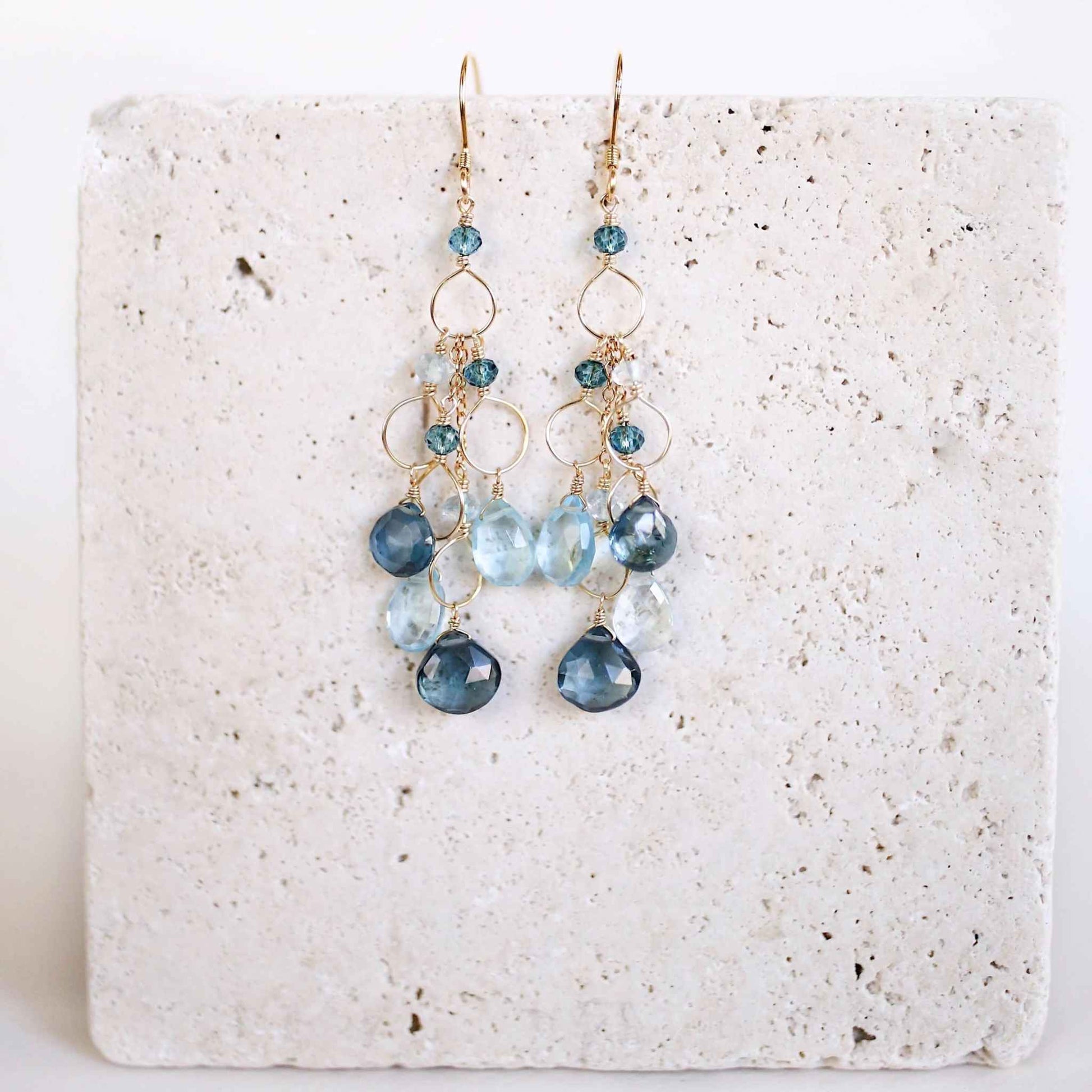 Iolite & Aquamarine Gold Waterfall EarringsElegant Iolite &amp; Aquamarine Gold Waterfall Earrings feature a unique tiered chandelier earring design, set in 14k gold plated over fine .925 Italian sterling silEarringsPARKEN JEWELRYVettedArcIolite & Aquamarine