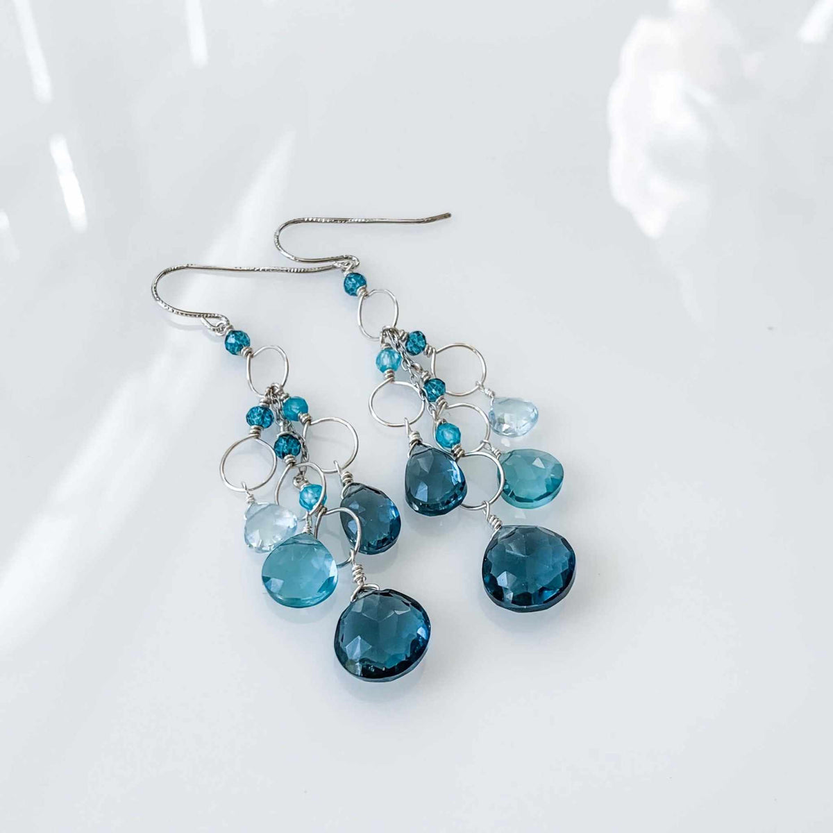 Iolite & Aquamarine Gold Waterfall EarringsElegant Iolite &amp; Aquamarine Gold Waterfall Earrings feature a unique tiered chandelier earring design, set in 14k gold plated over fine .925 Italian sterling silEarringsPARKEN JEWELRYVettedArcIolite & Aquamarine