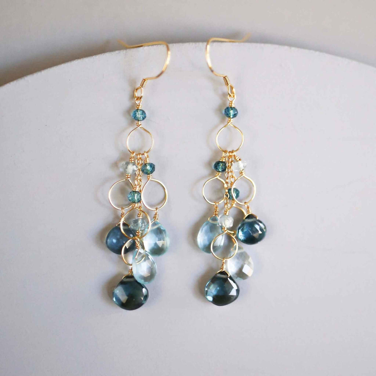 Iolite & Aquamarine Gold Waterfall EarringsElegant Iolite &amp; Aquamarine Gold Waterfall Earrings feature a unique tiered chandelier earring design, set in 14k gold plated over fine .925 Italian sterling silEarringsPARKEN JEWELRYVettedArcIolite & Aquamarine