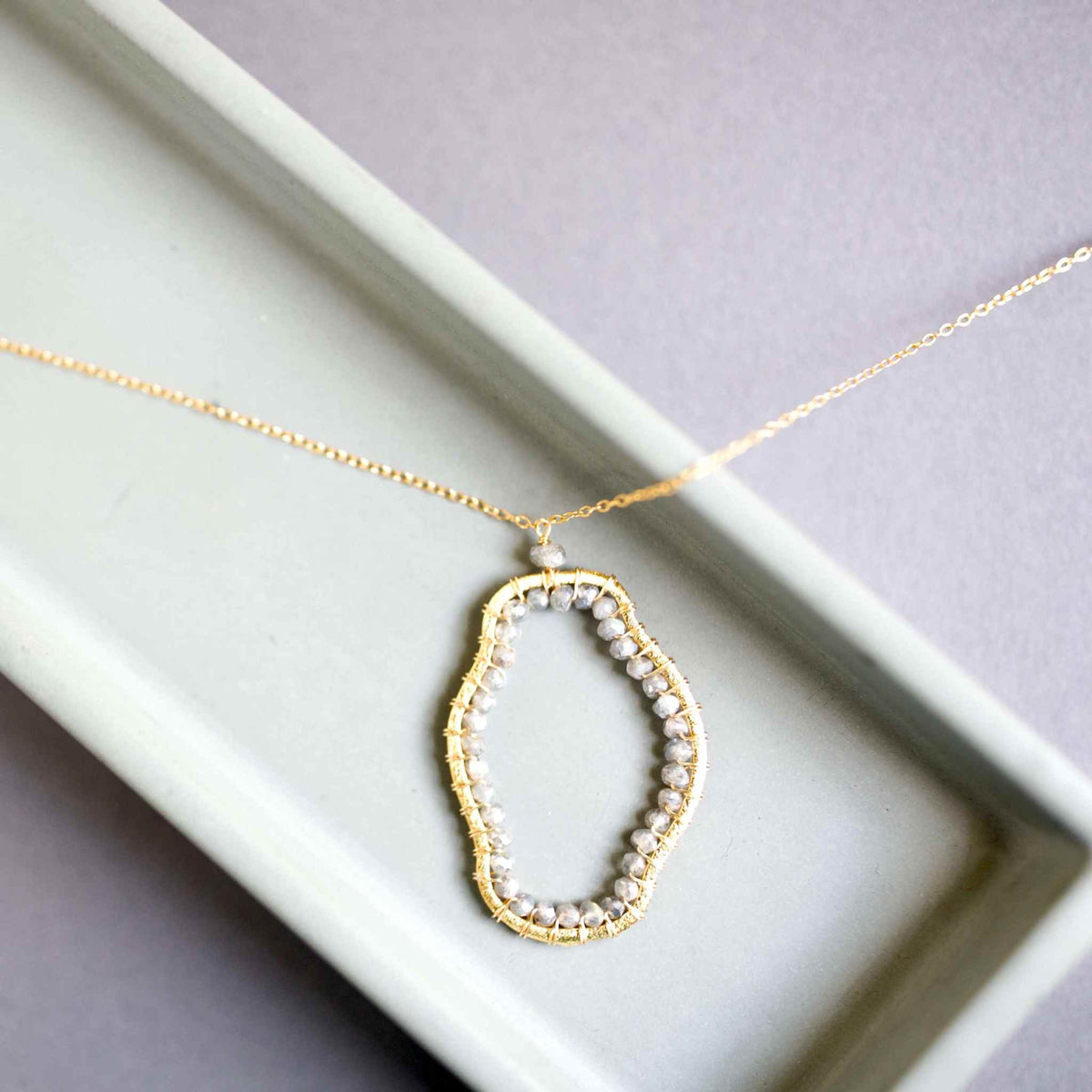 Unique gold Labradorite Freestyle Pendant Necklace with delicate chain and faceted gemstone