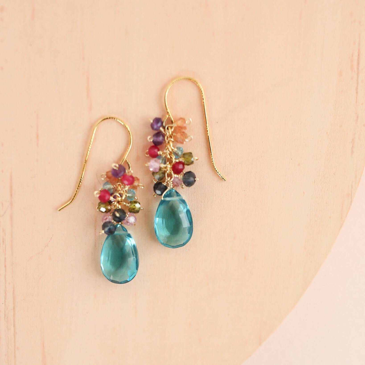 Neon Blue Quartz Bala EarringsStunning drops of color. Gold drop earrings made with neon blue quartz topped with a rainbow cluster of gems.
- 1.25" long- French hooks- 14k gold plated .925 fine IEarringsPARKEN JEWELRYVettedArcNeon Blue Quartz