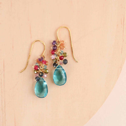 Neon Blue Quartz Bala EarringsStunning drops of color. Gold drop earrings made with neon blue quartz topped with a rainbow cluster of gems.
- 1.25" long- French hooks- 14k gold plated .925 fine IEarringsPARKEN JEWELRYVettedArcNeon Blue Quartz