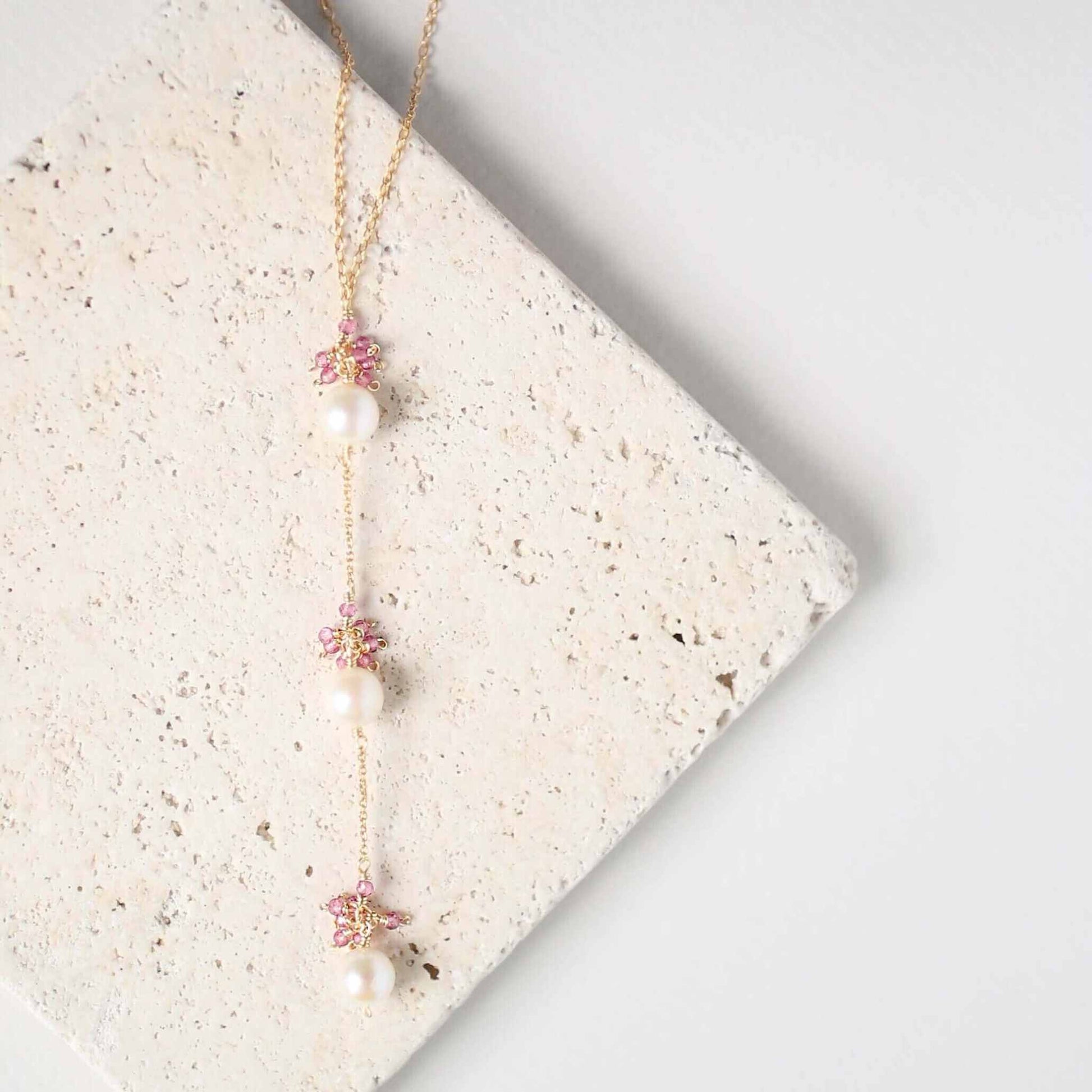 Pearl and Aquamarine Quartz NecklaceY design with 3 white freshwater bead pearls paired with genuine aquamarine quartz  gemstones.
Handmade necklace is 18" long with a 2" extender (up to 20") and 14k gNecklacesPARKEN JEWELRYVettedArcPearl And Aquamarine Quartz Necklace