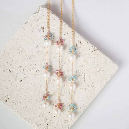 Pearl and Aquamarine Quartz NecklaceY design with 3 white freshwater bead pearls paired with genuine aquamarine quartz  gemstones.
Handmade necklace is 18" long with a 2" extender (up to 20") and 14k gNecklacesPARKEN JEWELRYVettedArcPearl And Aquamarine Quartz Necklace