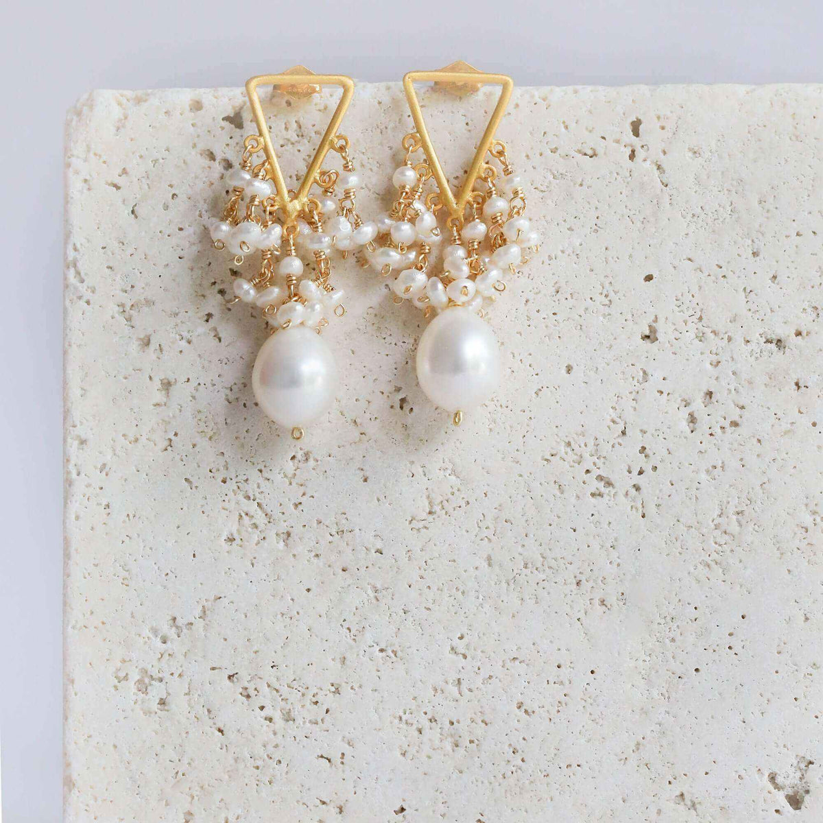 Freshwater pearl fringe earrings with 14k gold plated Italian silver, 1.25" length, post backs, and tarnish-resistant finish