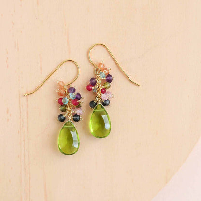 Peridot Quartz Bala EarringsStunning drops of color. Gold drop earrings made with peridot quartz topped with a rainbow cluster of gems.
- French hooks- 1.25" long- 14k gold plated .925 fine ItaEarringsPARKEN JEWELRYVettedArcPeridot Quartz