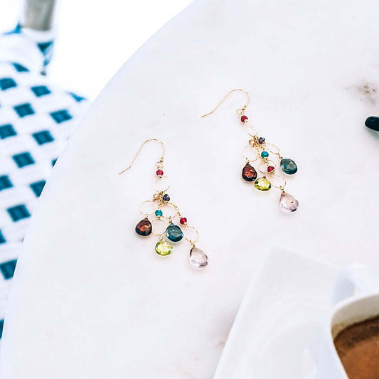 Rainbow Gemstone Waterfall Earrings with pink quartz, iolite, peridot, and garnet gemstones on gold plated sterling silver French hooks.
