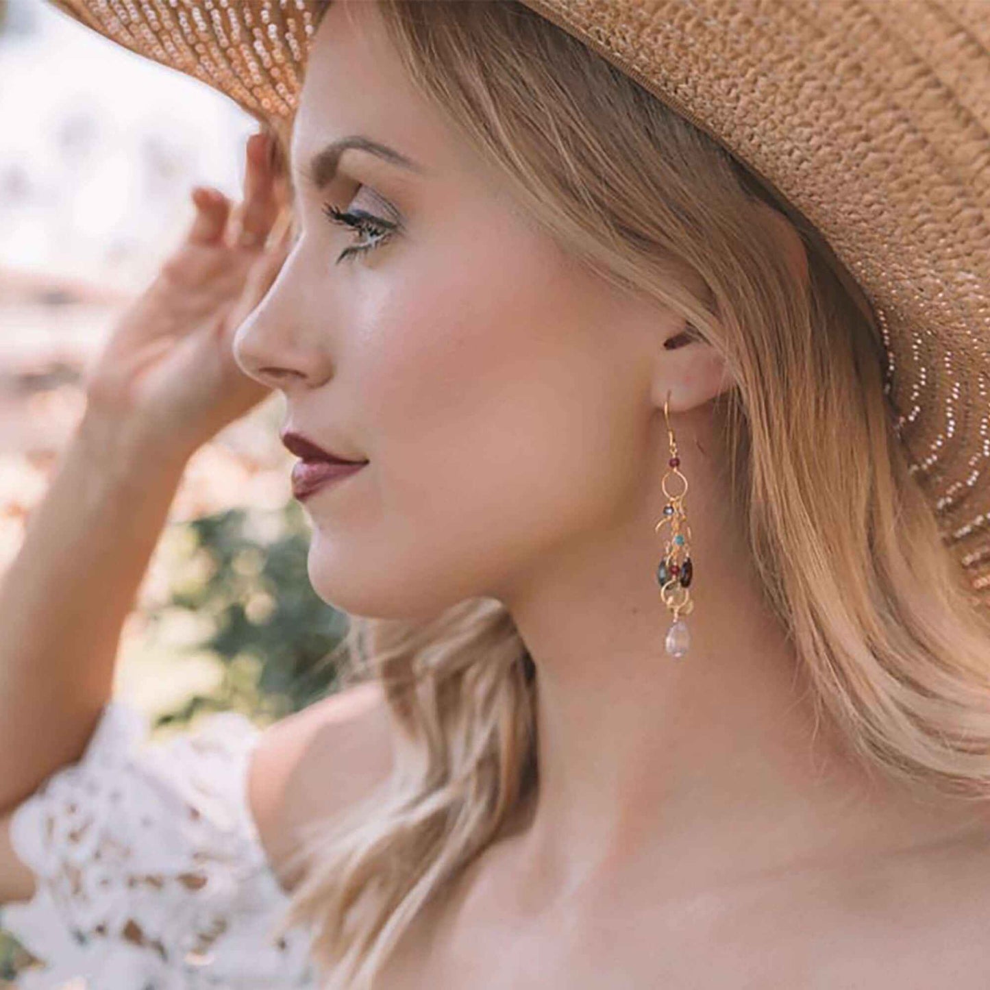 Rainbow Gemstone Waterfall Earrings with pink quartz, iolite, peridot, and garnet gemstones, 14k gold plated sterling silver chandelier design