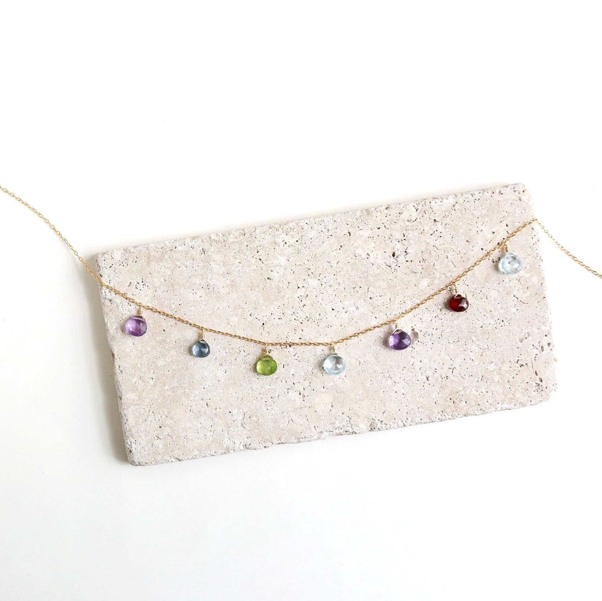 Gold Rainbow Sparkler Necklace with aquamarine, garnet, iolite, amethyst, and peridot gemstones on 14k gold plated sterling silver chain