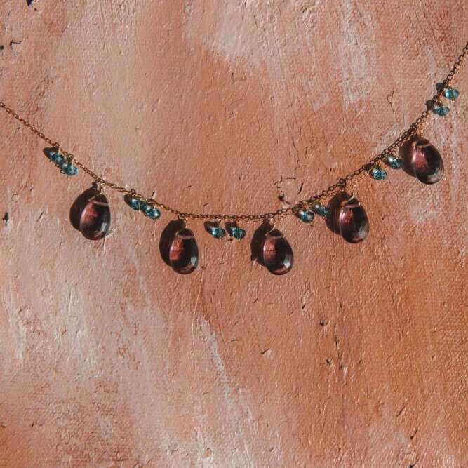 Rhodolite garnet sparkler necklace with deep purple garnet and bright blue aquamarine on adjustable 14k gold plated chain