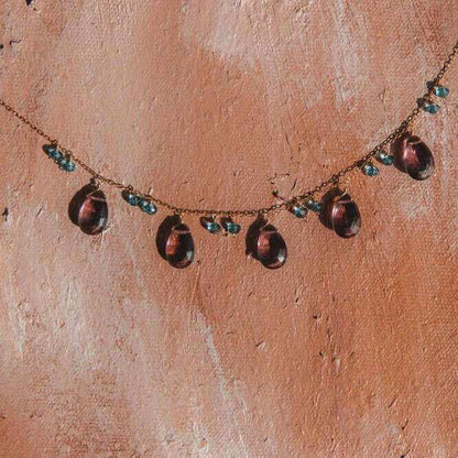 Rhodolite garnet sparkler necklace with deep purple garnet and bright blue aquamarine on adjustable 14k gold plated chain