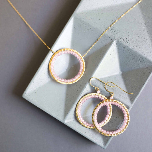 Rose Quartz Halo Necklace with sparkling quartz gems and 14k gold plated silver chain