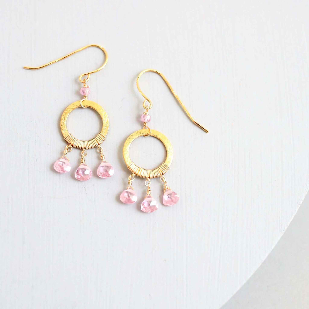 Rose Quartz Mini Boho EarringsInspired by dream catchers, these boho minis are ready-to-wear with anything. 
- Rose Quartz gemstones- 1.5" long- French Hooks- 14k gold plated over .925 Italian fiEarringsPARKEN JEWELRYVettedArcRose Quartz Mini Boho Earrings