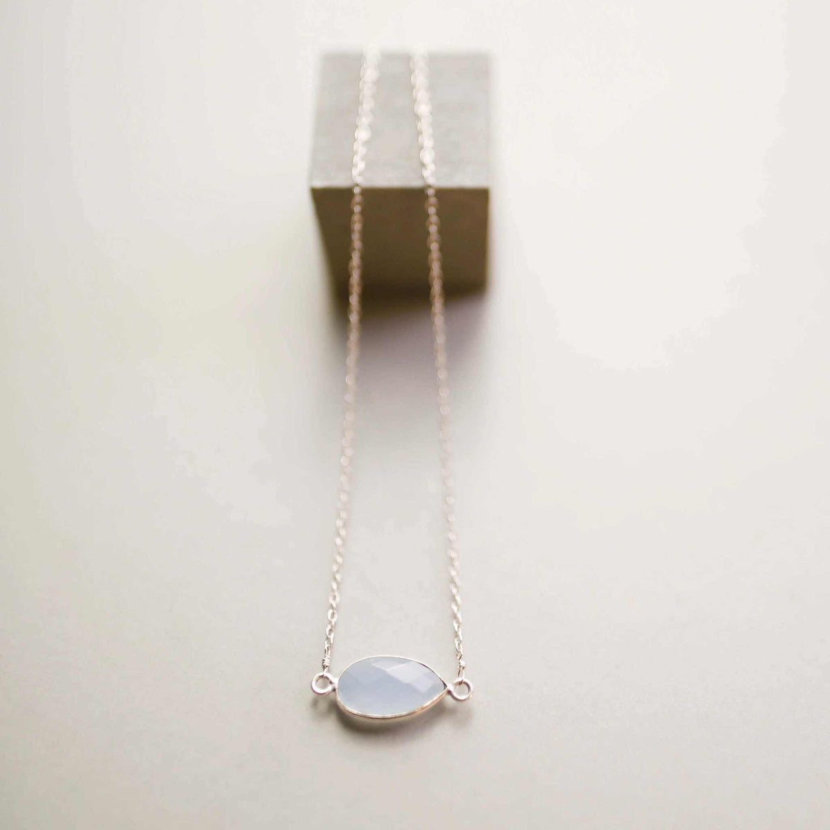 Blue Chalcedony Silver Minimalist NecklaceSimple, silver minimalist necklace with a beautiful blue chalcedony bezel set stone. Great for layering.- 16-18" long. Necklace has a 2" extender- Spring ring clasp-NecklacesPARKEN JEWELRYVettedArcsimple silver necklace
