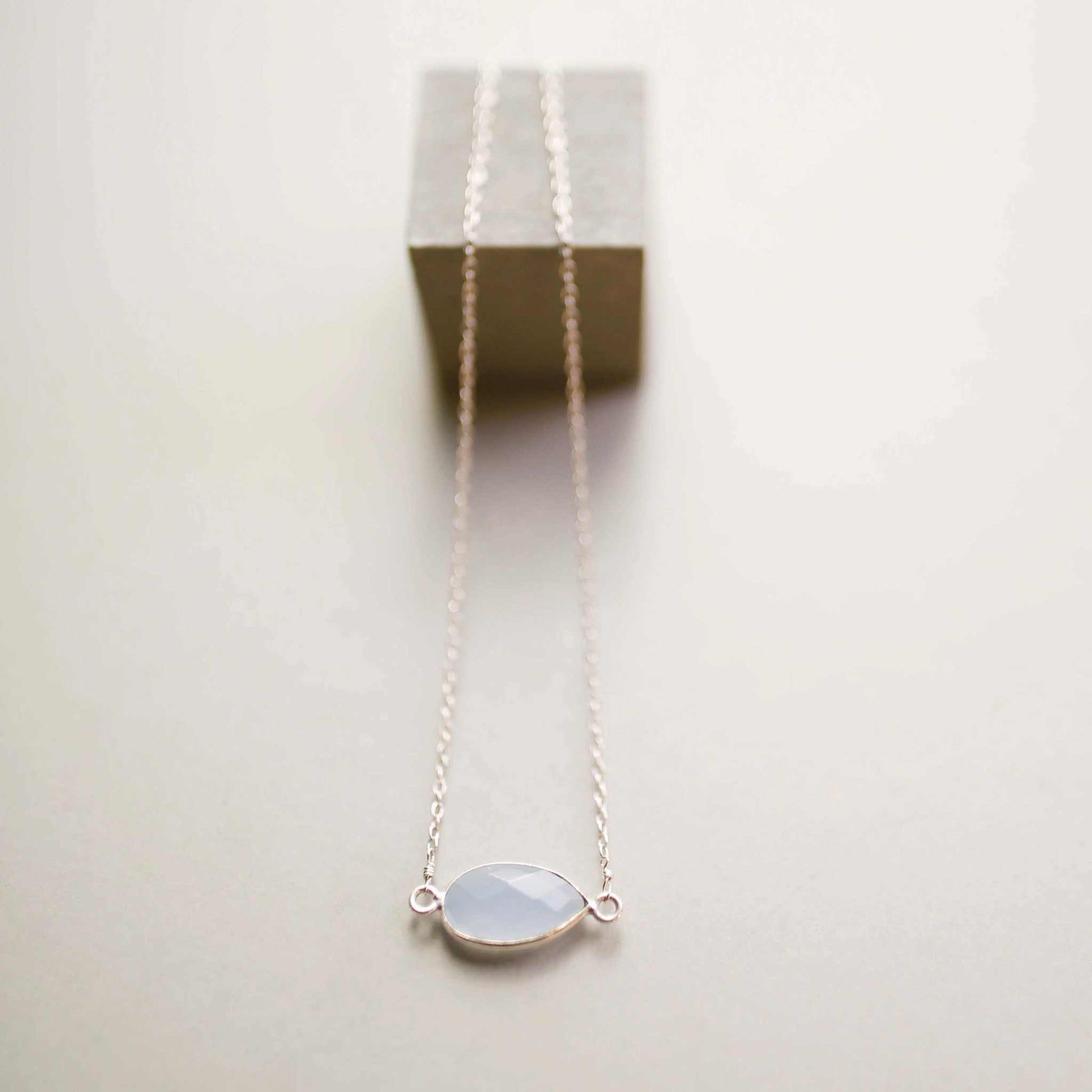 Blue Chalcedony Silver Minimalist NecklaceSimple, silver minimalist necklace with a beautiful blue chalcedony bezel set stone. Great for layering.- 16-18" long. Necklace has a 2" extender- Spring ring clasp-NecklacesPARKEN JEWELRYVettedArcsimple silver necklace