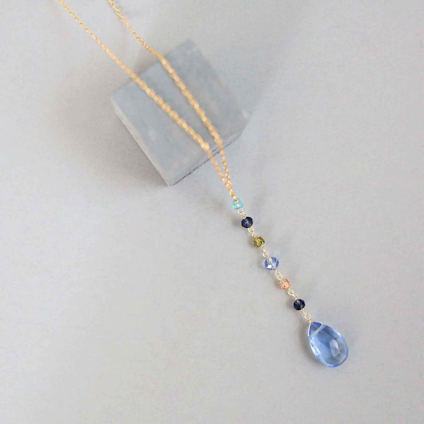 Sky Blue Quartz Yoga Pendant NecklaceYoga pendants are designed for total simplicity.
- Y pendant style- Sky quartz gemstones paired with multi color gemstone accent stones- 18-20" long with a 2" extendNecklacesPARKEN JEWELRYVettedArcSky Blue Quartz