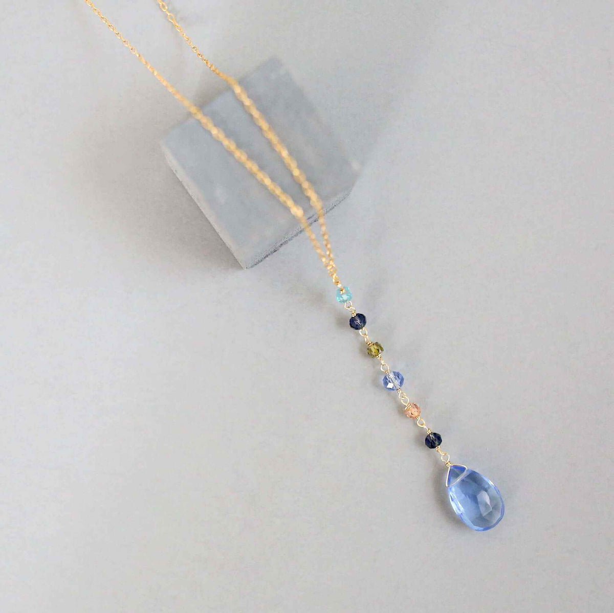 Sky Blue Quartz Yoga Pendant NecklaceYoga pendants are designed for total simplicity.
- Y pendant style- Sky quartz gemstones paired with multi color gemstone accent stones- 18-20" long with a 2" extendNecklacesPARKEN JEWELRYVettedArcSky Blue Quartz