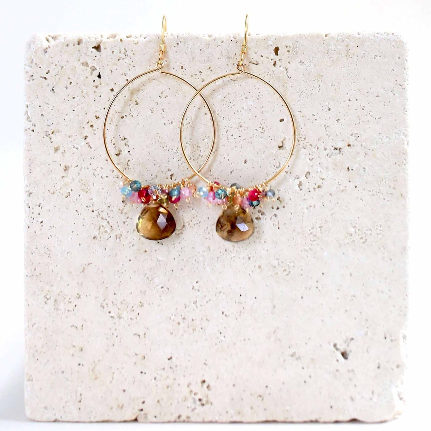 Delicate smoky quartz swing earrings with 14k gold plated sterling silver hoops and French hooks.