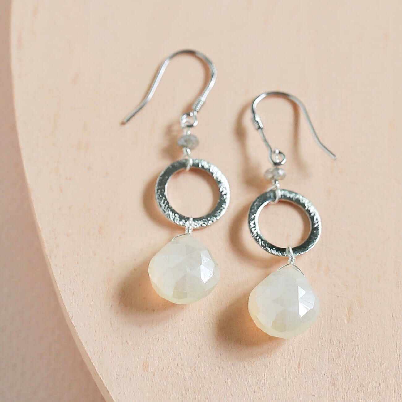 The Airie Earring featuring white chalcedony and rhodium plated sterling silver with French hooks