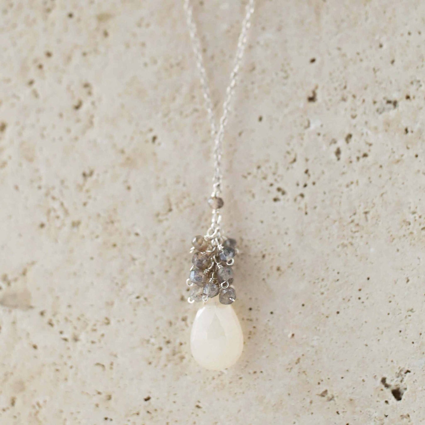 White Chalcedony Cluster Necklace with raindrop pendants and labradorite gems on gold plated sterling silver chain
