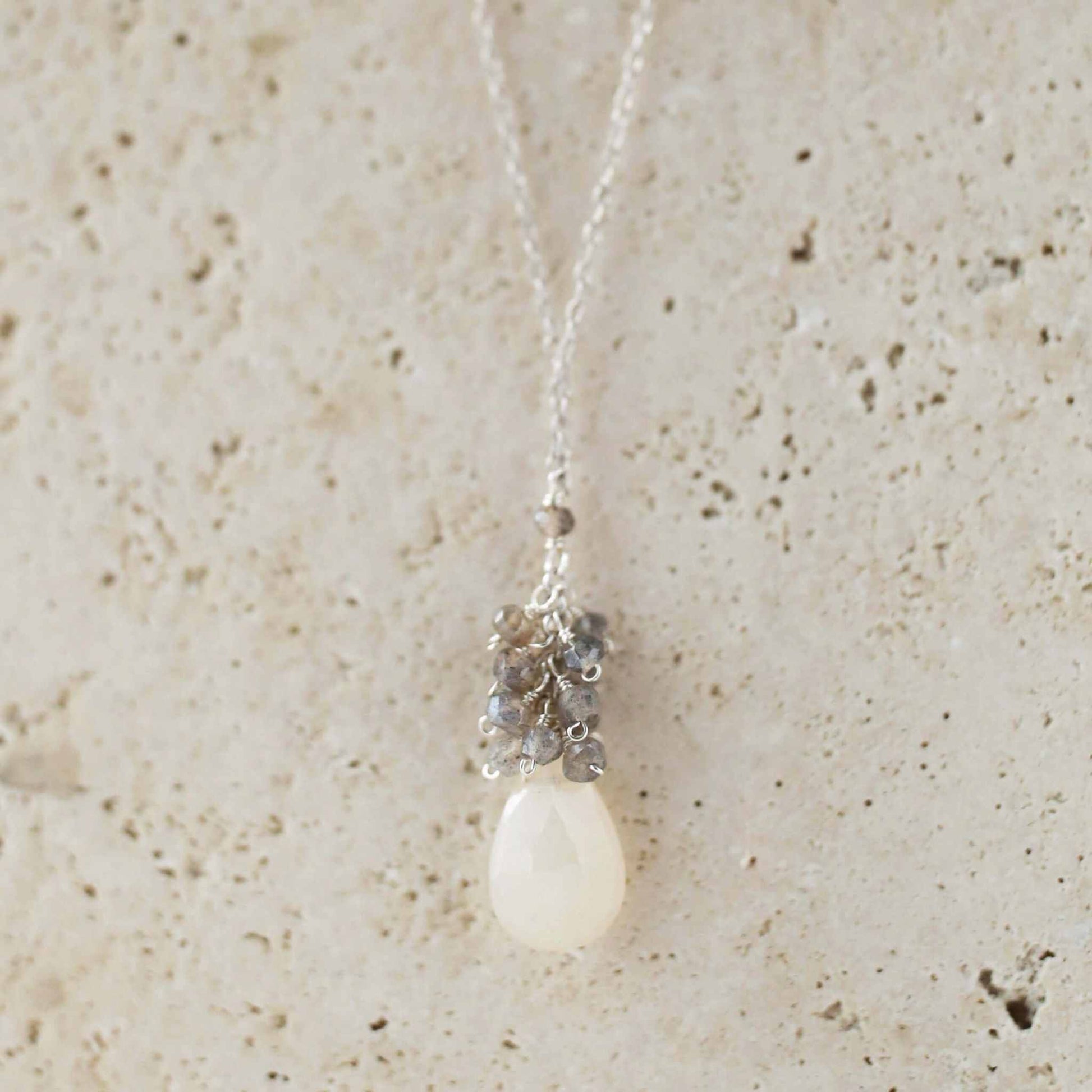 White Chalcedony Cluster Necklace with raindrop pendants and labradorite gems on gold plated sterling silver chain