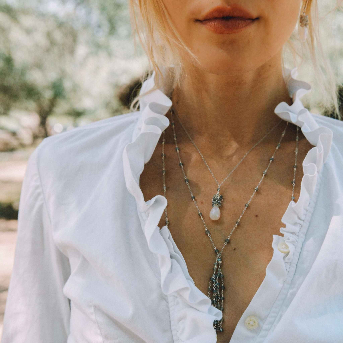 White chalcedony cluster necklace with labradorite gems and gold plated sterling silver clasp