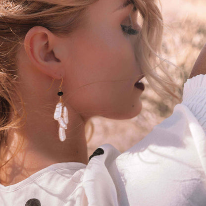 White stick pearl earrings with cascading freshwater pearls and black spinel on 14k gold plated sterling silver French hooks